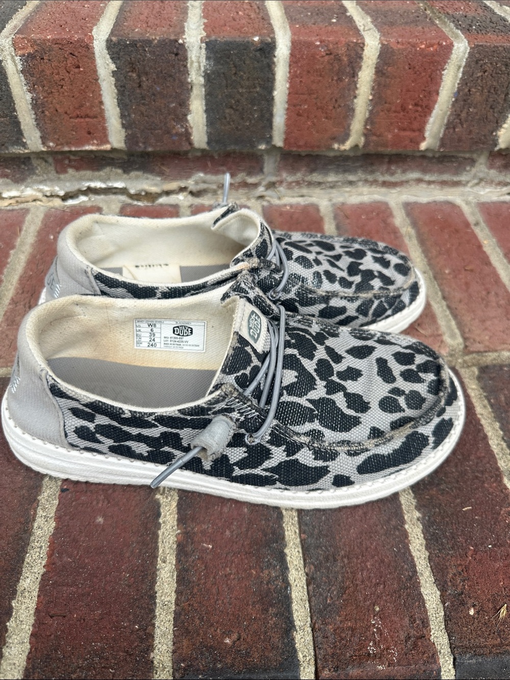 Hey Dude Women’s Slip-On Sneakers in Black & Gray Leopard Print